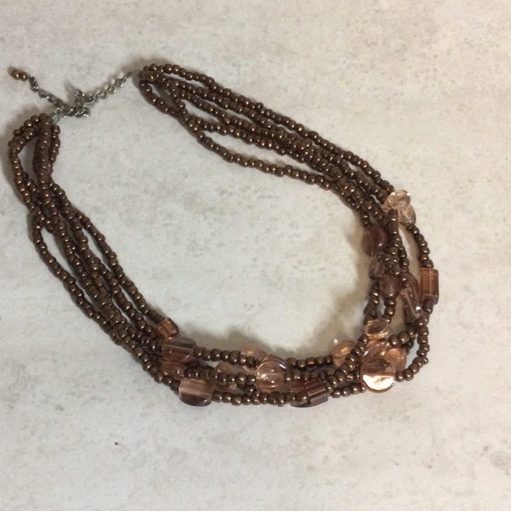 Five strand brown bead necklace
